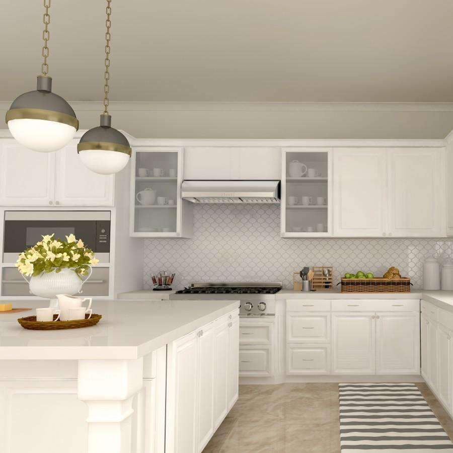 Under-cabinet stainless steel range hood installed over the cooktop