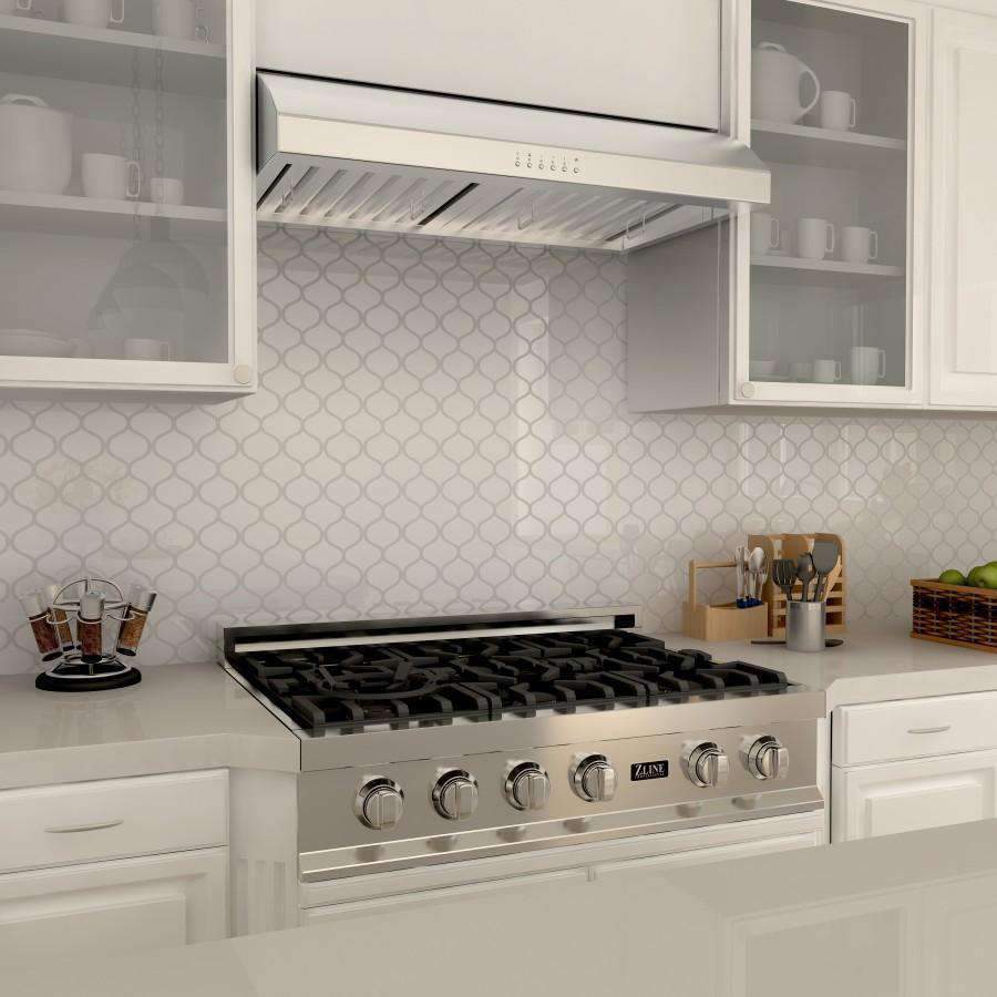 Stainless steel under-cabinet range hood with vent grille and button panel