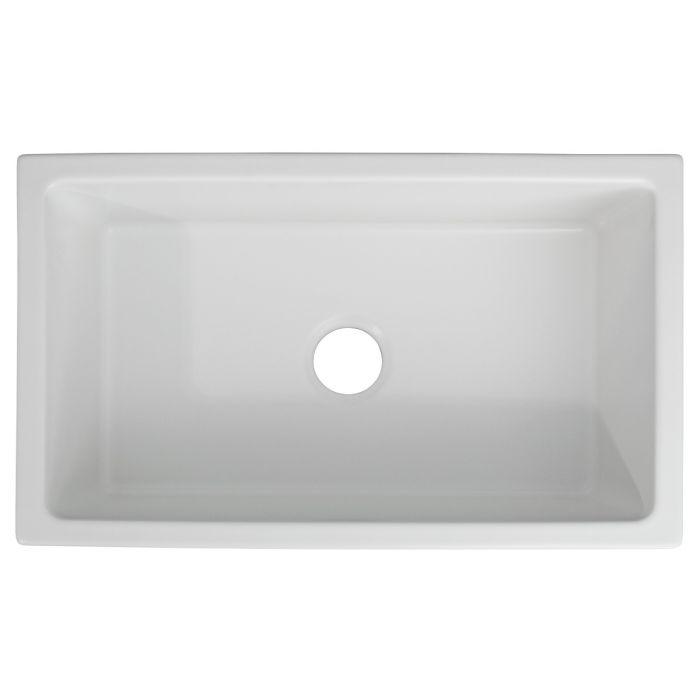 Rectangular white matte apron-front fireclay kitchen sink with single round drain opening