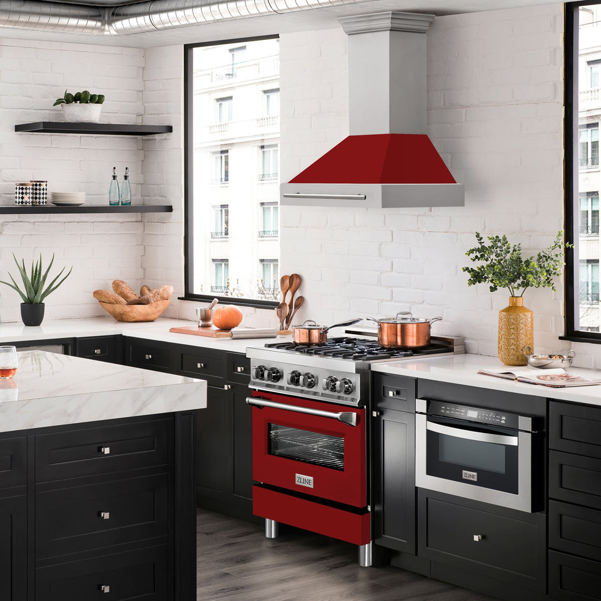 Wall-mounted range hood with red glossy shell above a kitchen cooktop