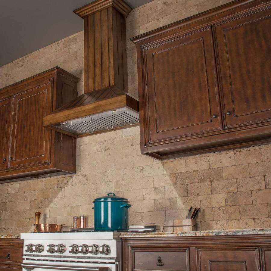 Rustic light wood wall range hood with chimney above stove in kitchen