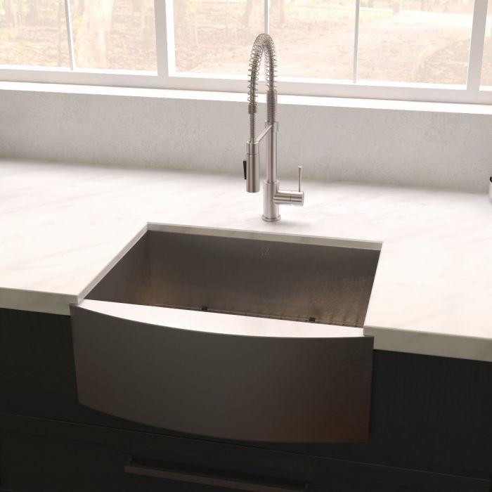 Apron sink with single basin and stainless finish on kitchen countertop