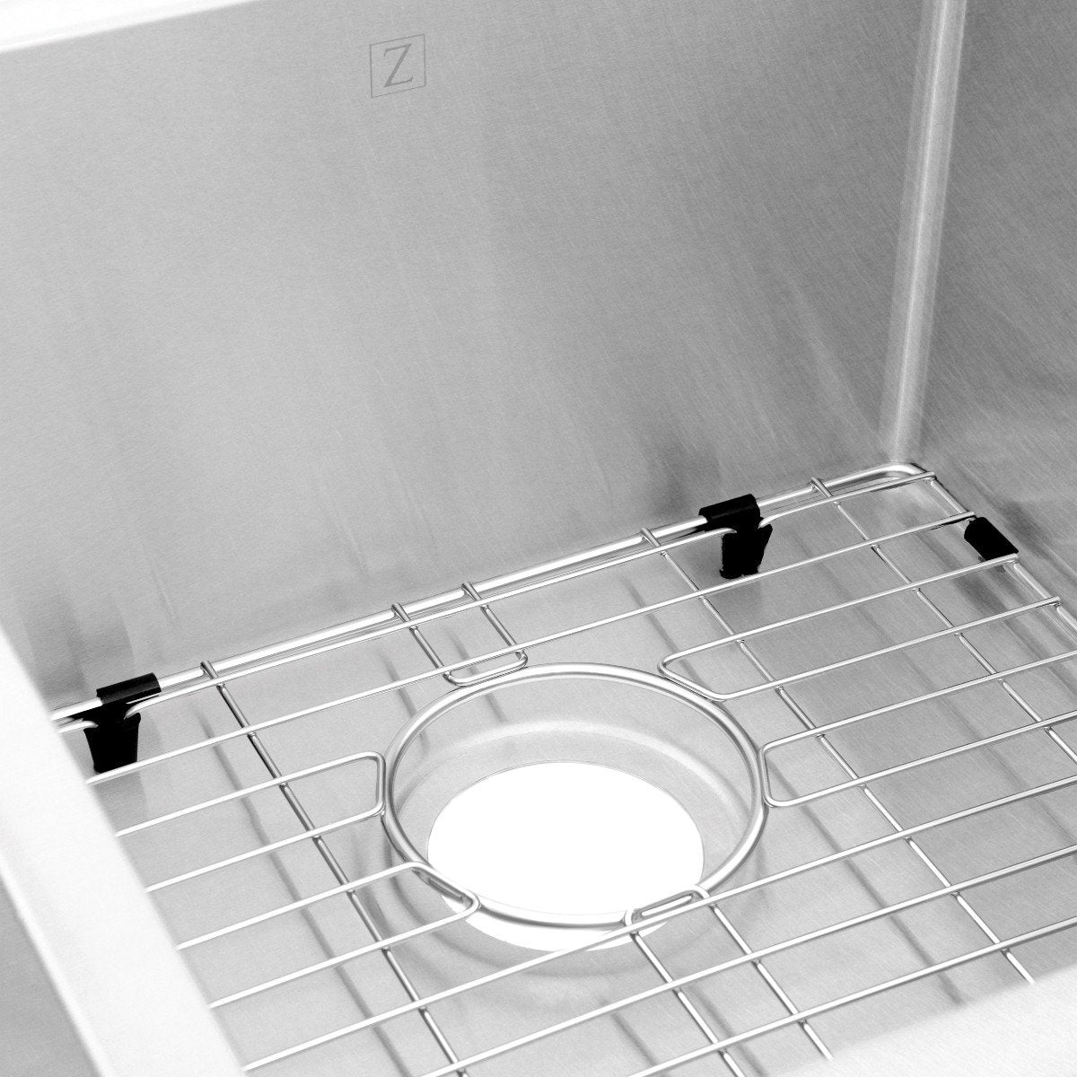 Stainless steel double-bowl kitchen sink bottom grid near drain opening