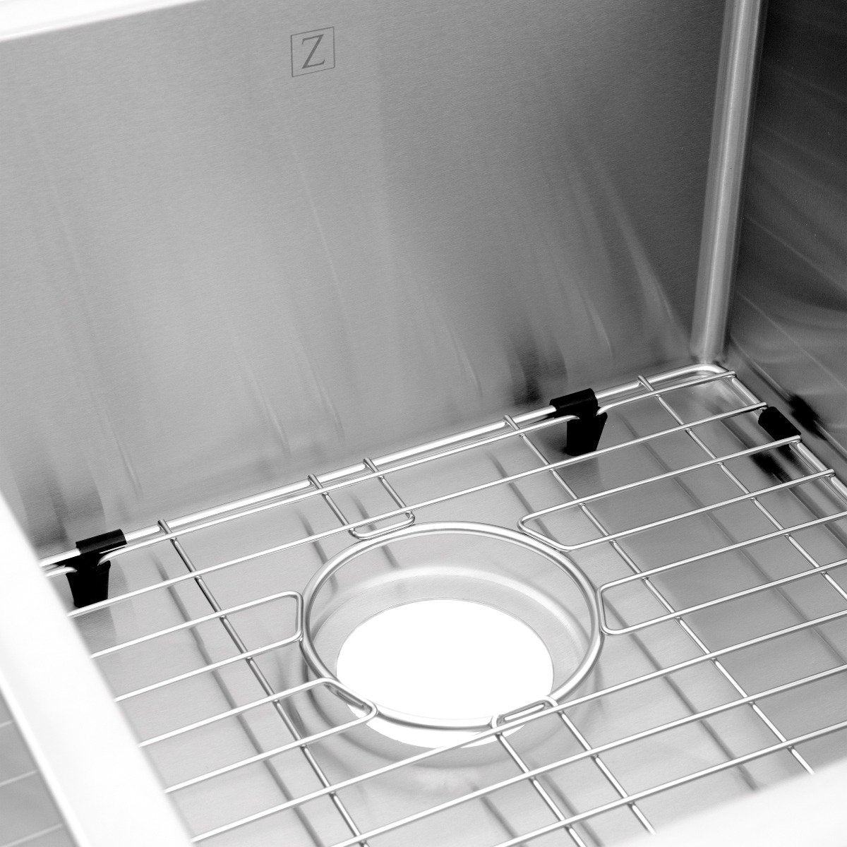 Stainless steel double-bowl sink corner with bottom grid and circular drain opening