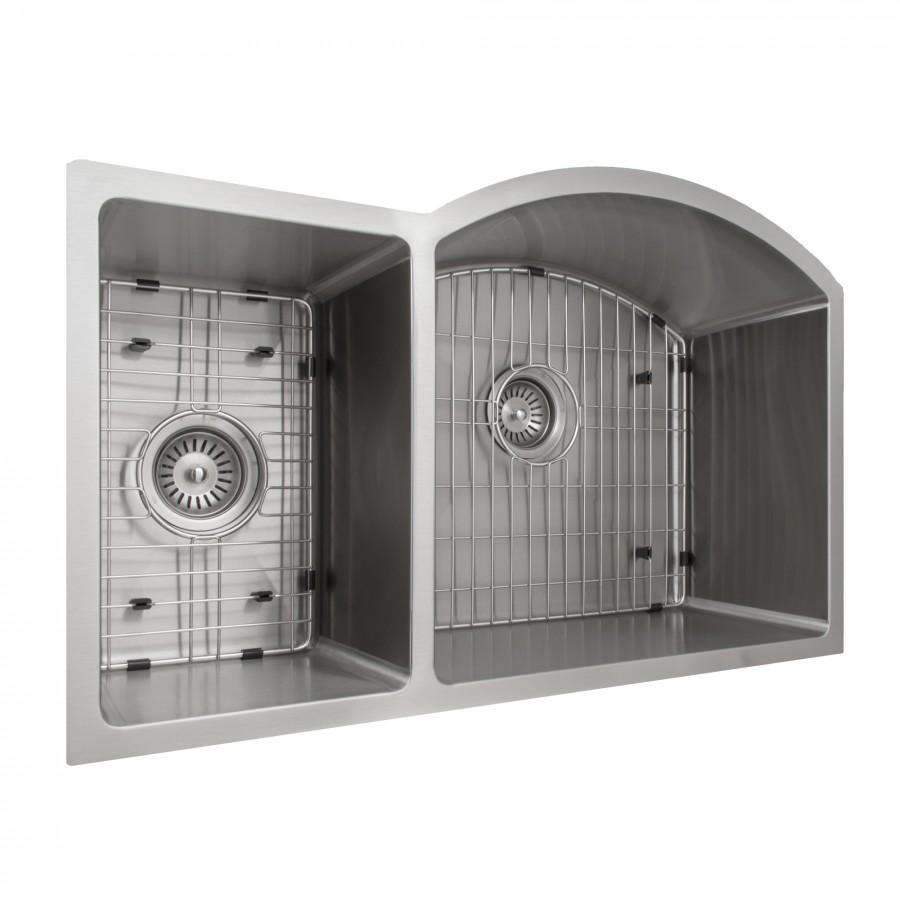 Stainless steel double-bowl sink showing wire grids and round drain openings