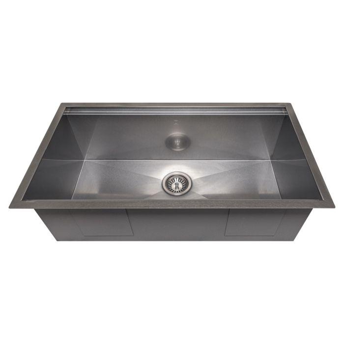Single-bowl stainless steel kitchen sink with centered drain strainer and sloped basin