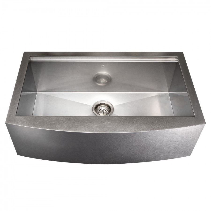 Single-bowl stainless steel sink with center drain strainer, open top view