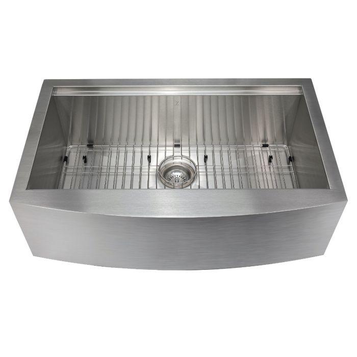 Apron-mount single-bowl stainless sink with raised bottom grid and drain strainer