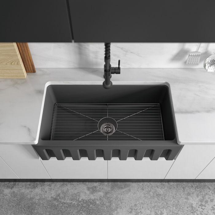 Charcoal kitchen sink basin with bottom grid insert and drain strainer in center