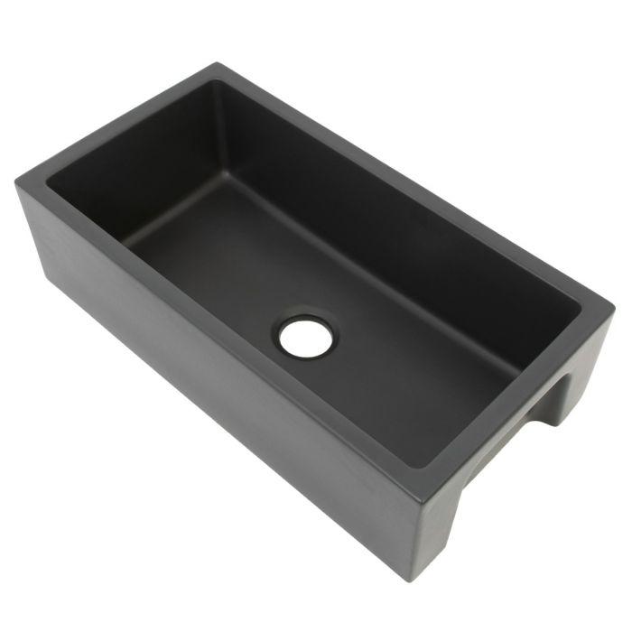 Charcoal single-bowl apron front sink with round drain hole, angled top view
