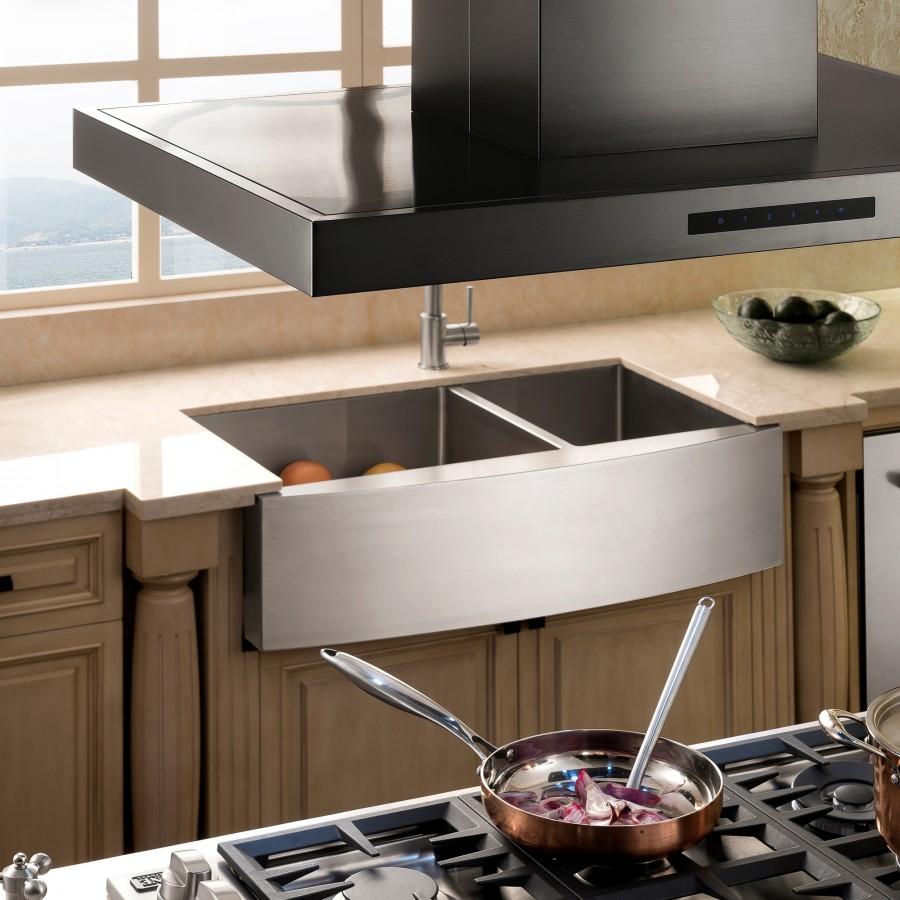 Black stainless steel island range hood with control bar and side chimney housing