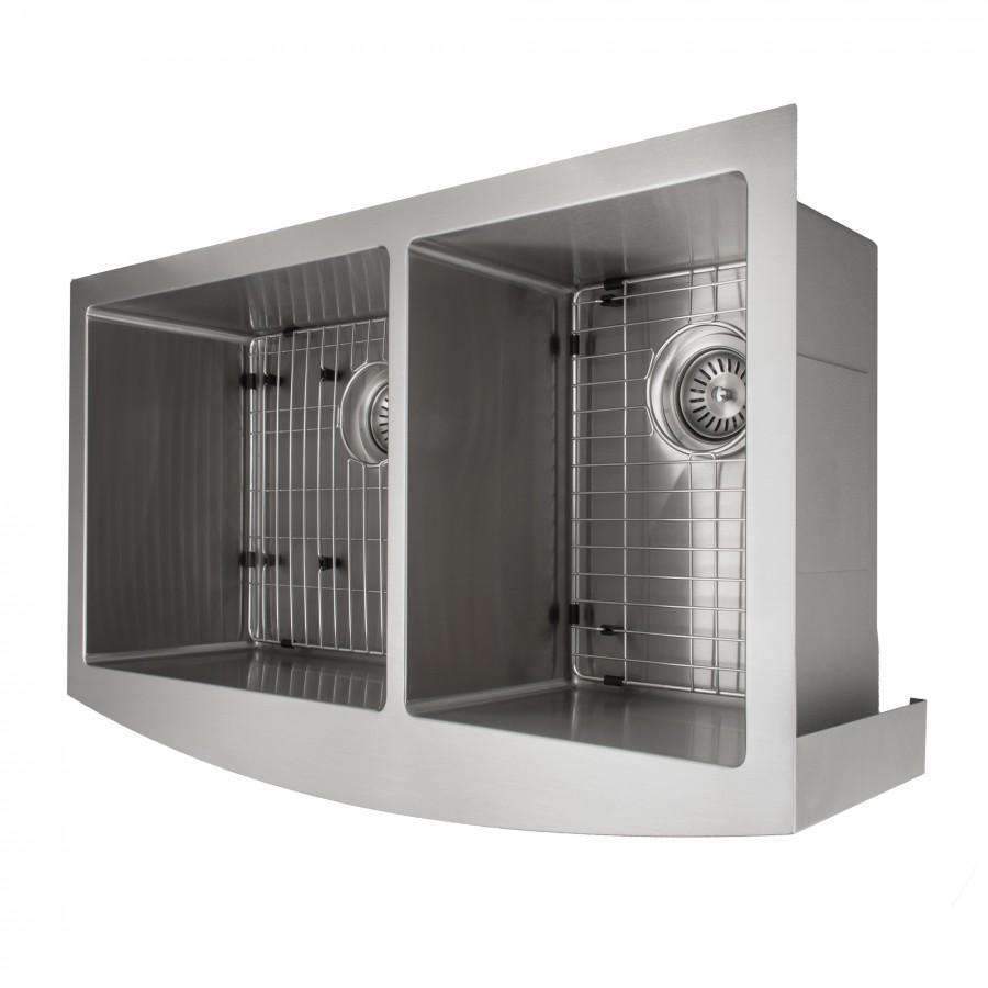 Stainless steel double-bowl sink with two sides and wire bottom racks installed.