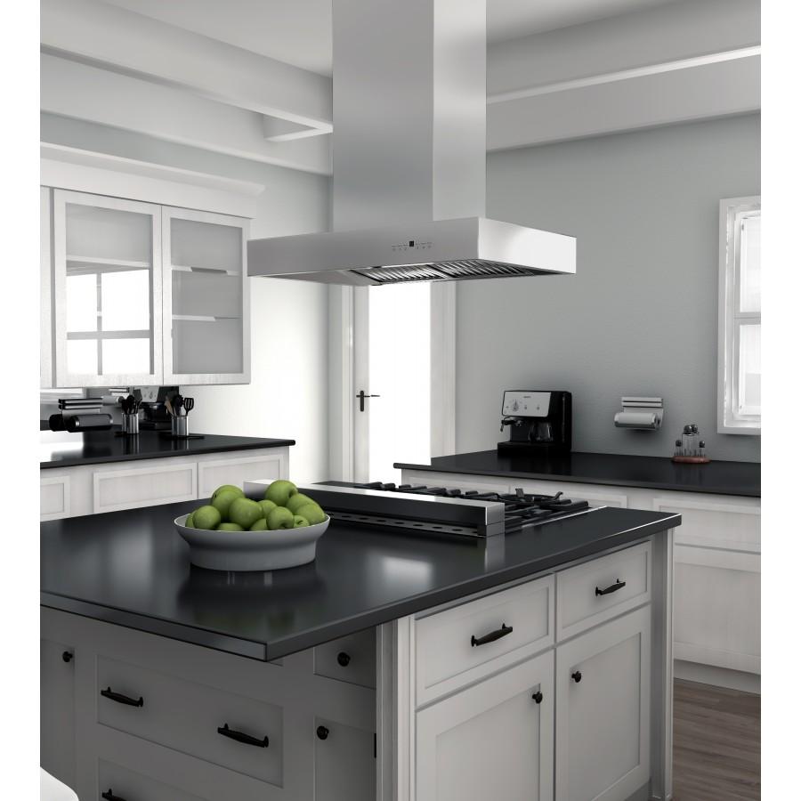 Island mount stainless steel range hood over dark cooktop in a built-in kitchen