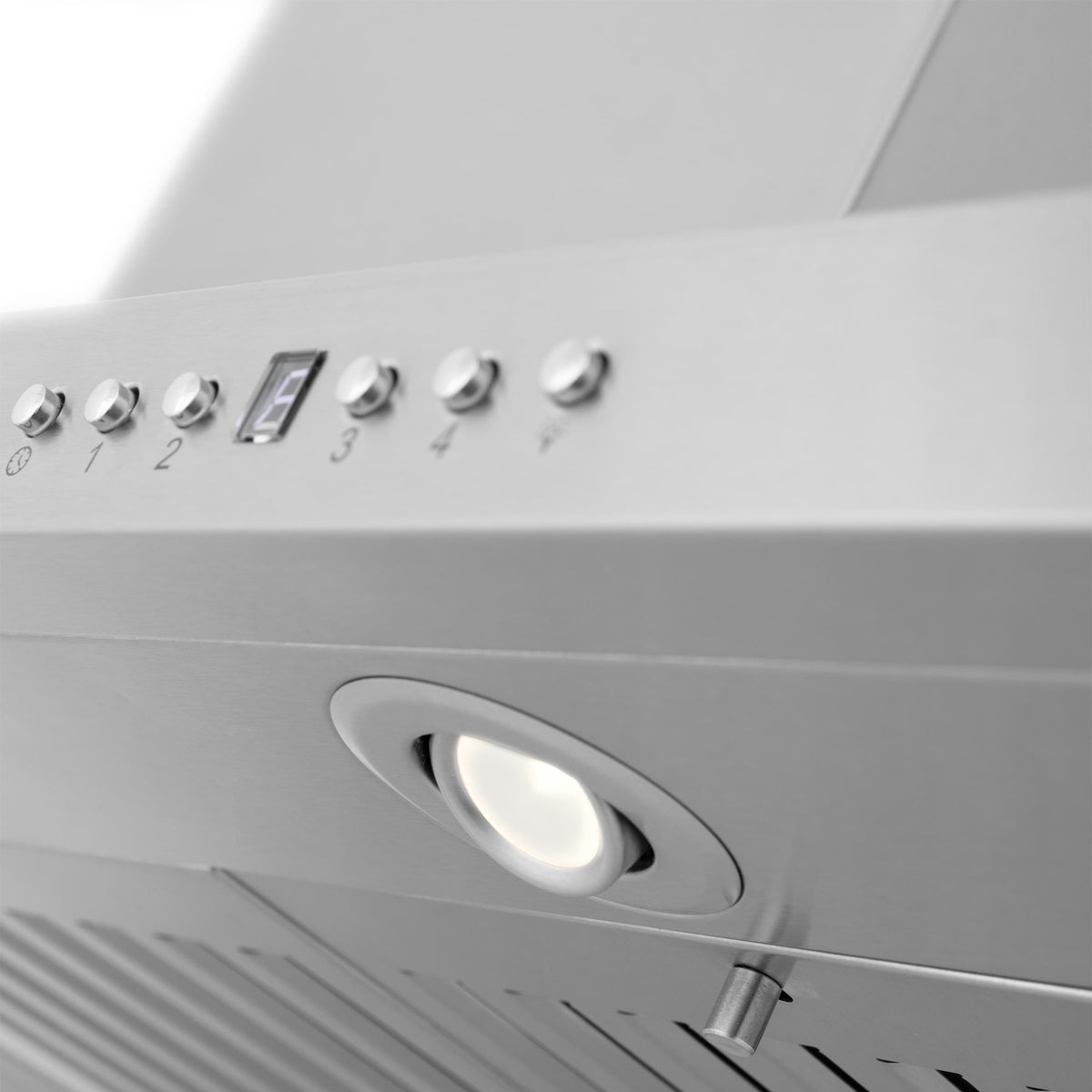 Control panel with numbered buttons and round light on stainless steel chimney hood