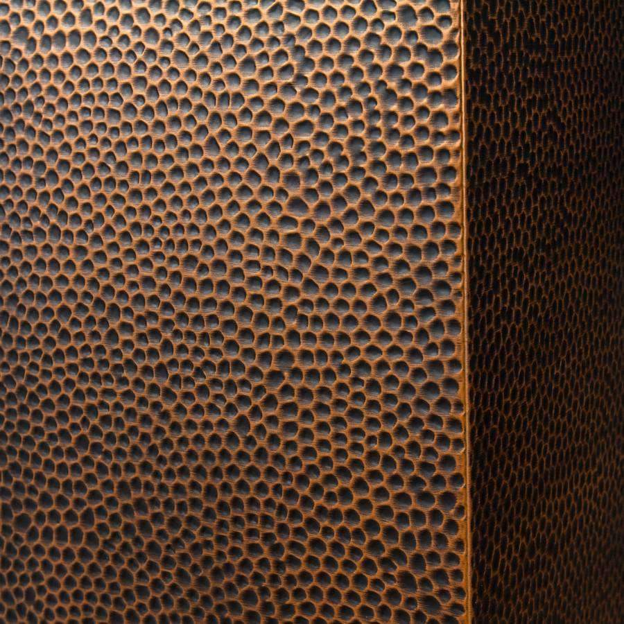 Hand-hammered copper metal texture close-up panel