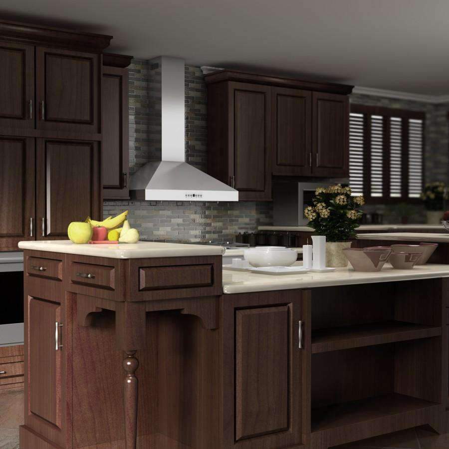 Stainless steel wall-mount range hood with chimney over kitchen cooktop