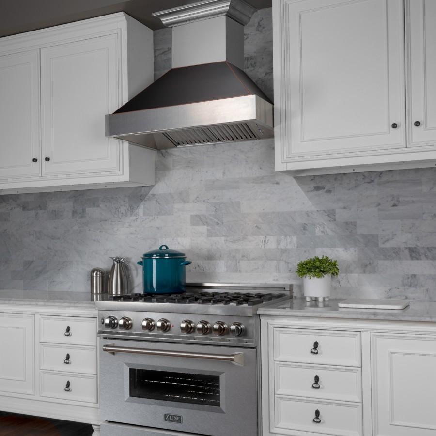 Wall mount ducted range hood with stainless steel chimney and dark vent hood underside