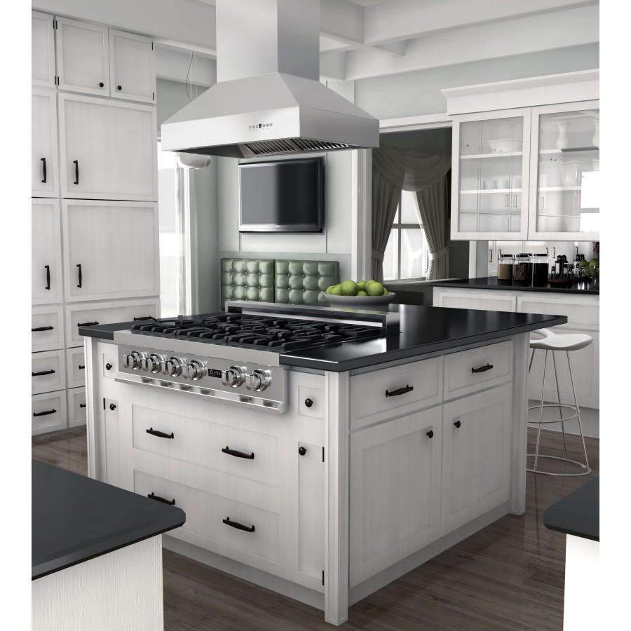 Stainless steel ducted island mount range hood above freestanding island cooktop