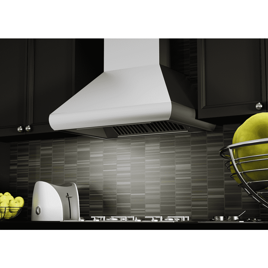 Stainless steel range hood under cabinet with vent grille and angled canopy
