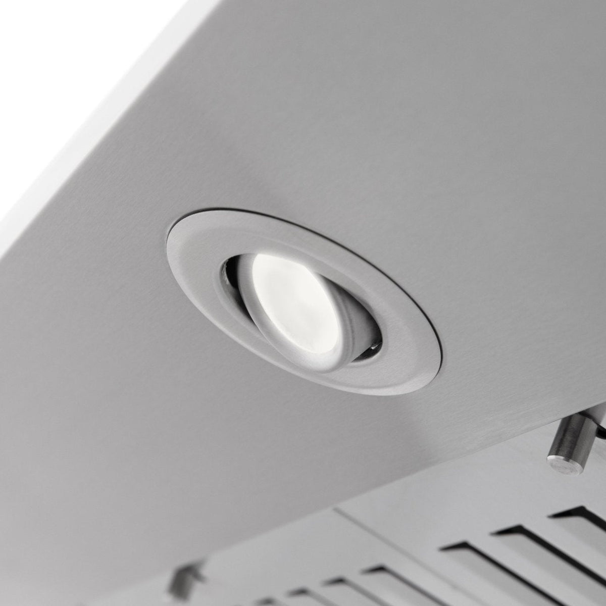 Stainless steel range hood recessed light in the canopy underside