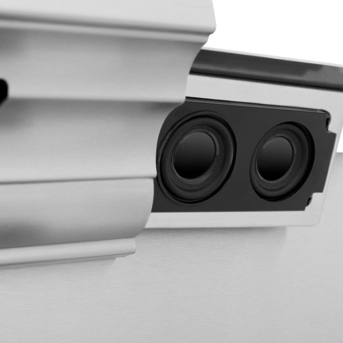 Built-in speaker grill on stainless steel range hood with two woofer openings