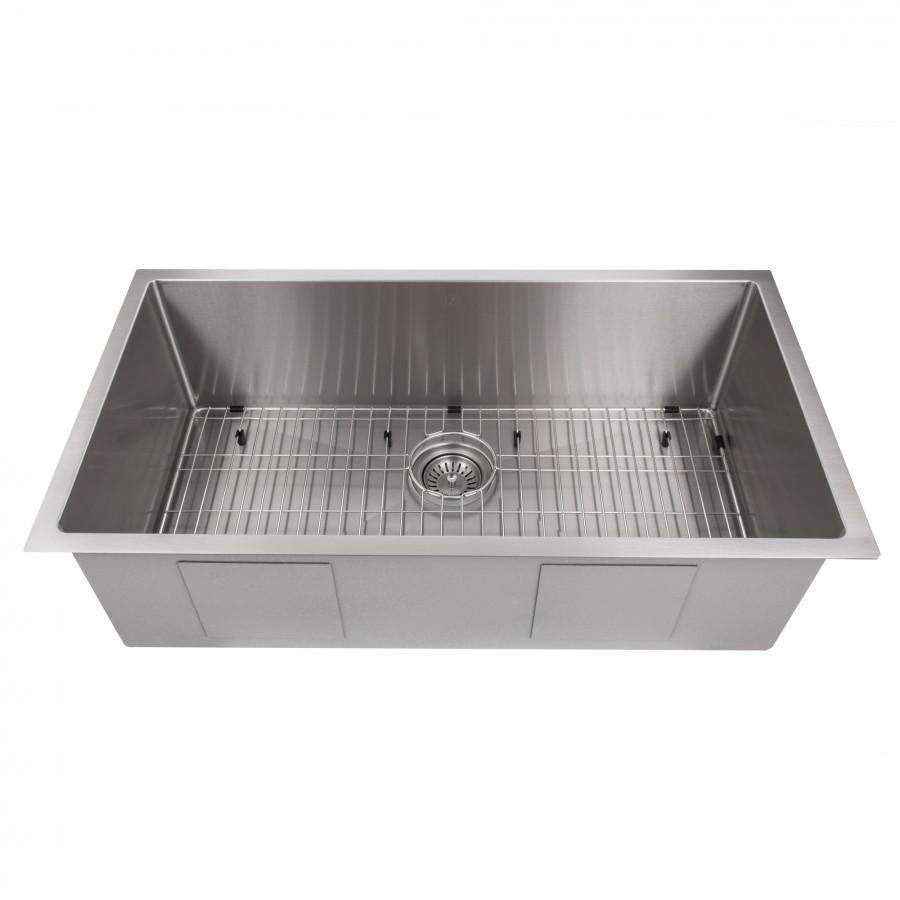 Single-bowl stainless steel sink interior with bottom grid and center drain