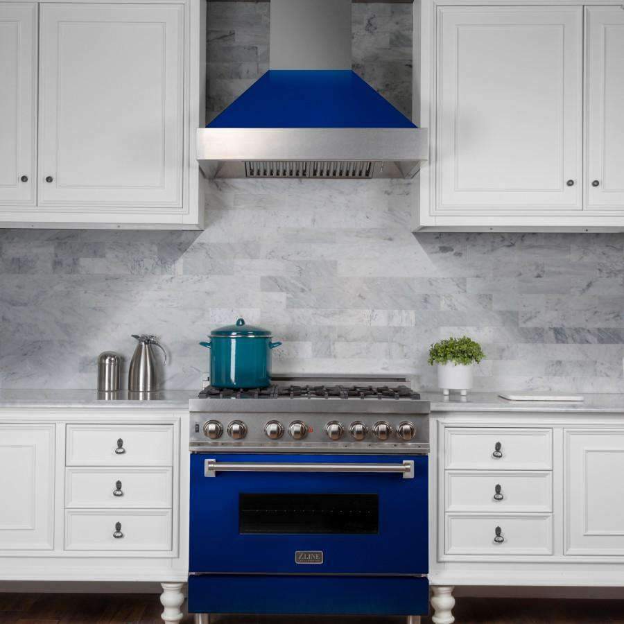 Blue dual fuel range with stainless burner knobs and centered black oven window