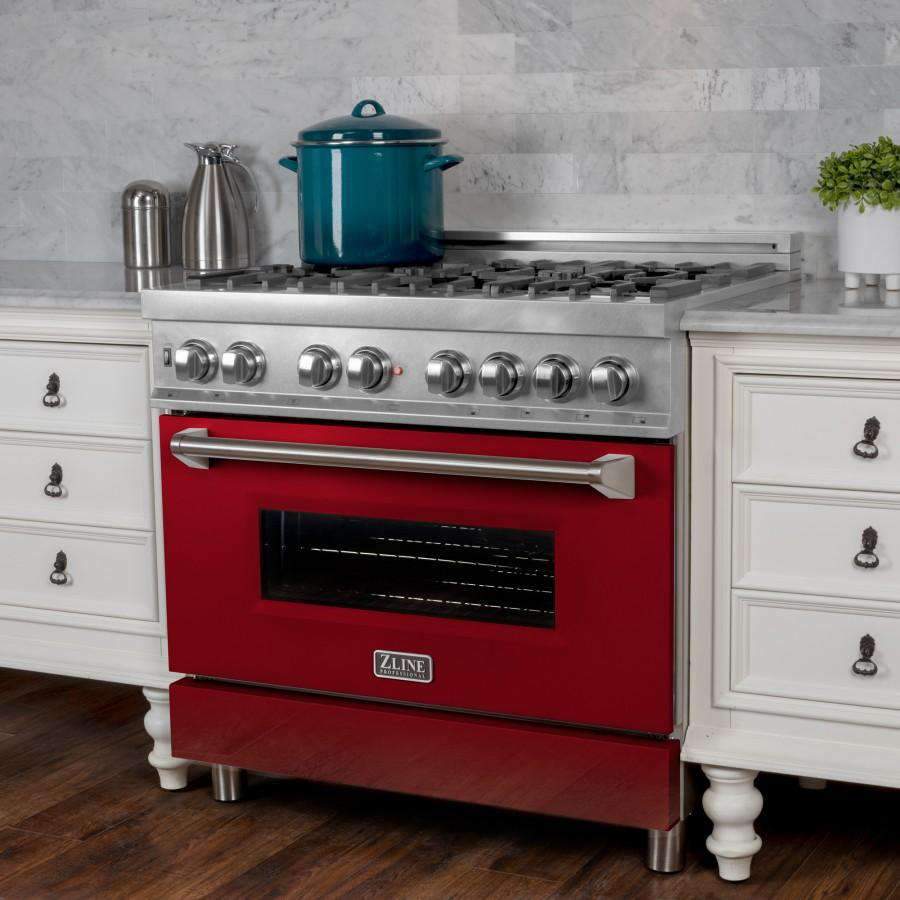 Stainless steel gas range with red oven door and multi-burner cooktop