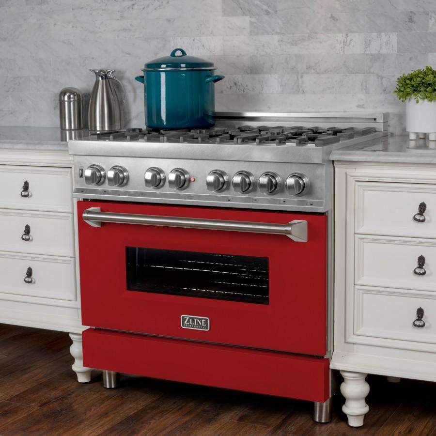Red dual fuel range with stainless front panel, black oven door window, and burner knobs