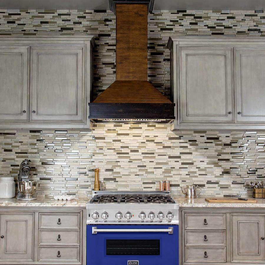 Dual fuel range in white cabinetry with blue matte oven door and stainless control panel
