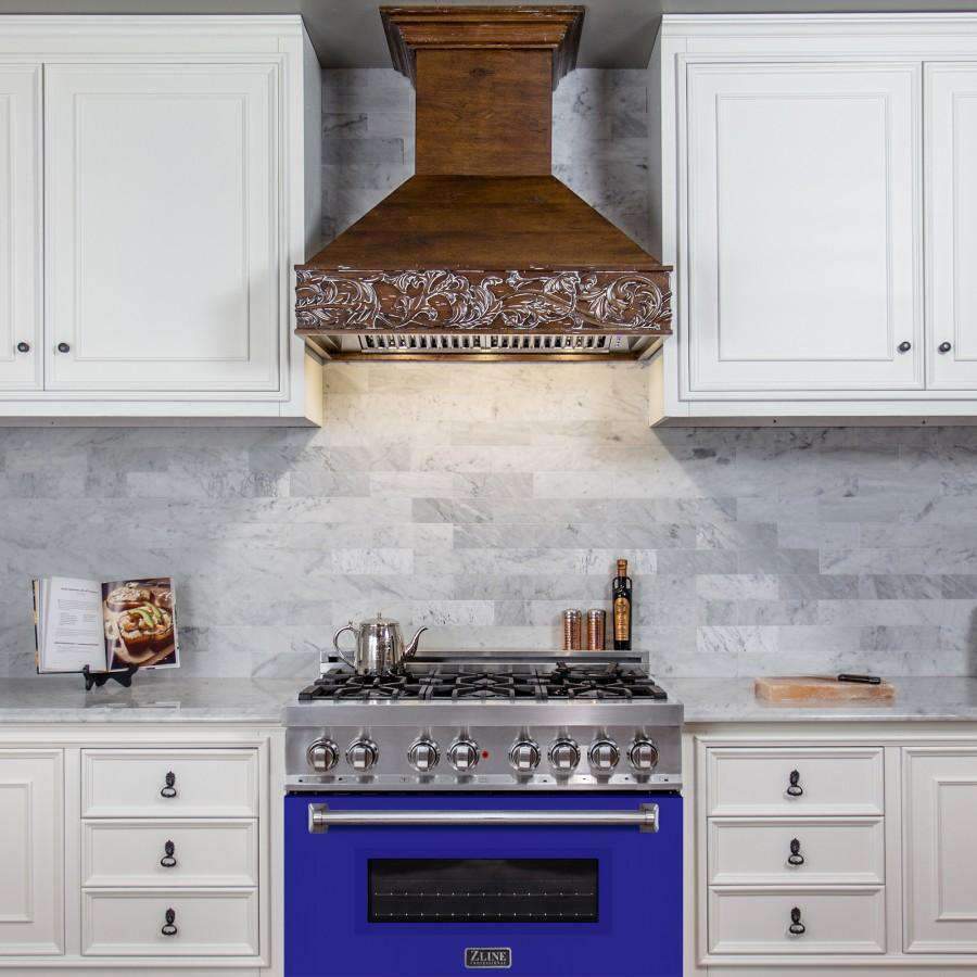 Dual fuel range featuring a blue matte oven door, stainless knobs, and warming handle