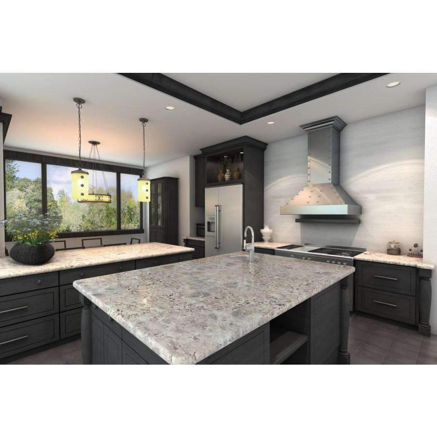 Stainless steel wall range hood over kitchen cooktop with chimney canopy