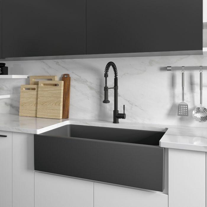Charcoal single-bowl farmhouse sink with gooseneck faucet and bottom grid