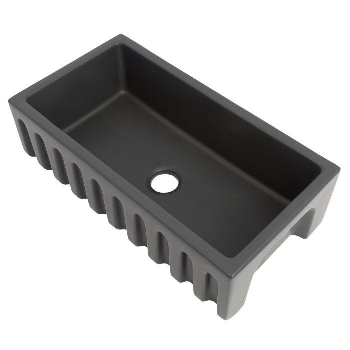 Charcoal fireclay single-bowl apron front sink with drain opening in basin