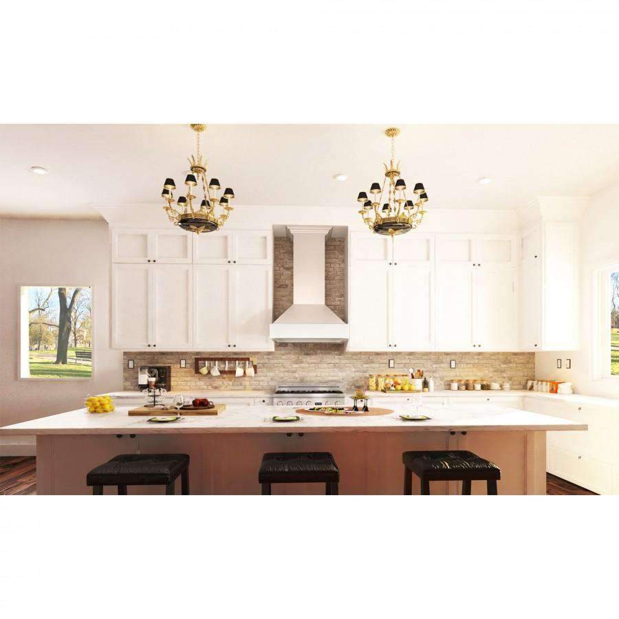 Cottage white wall mount range hood with crown molding and chimney-style exhaust canopy