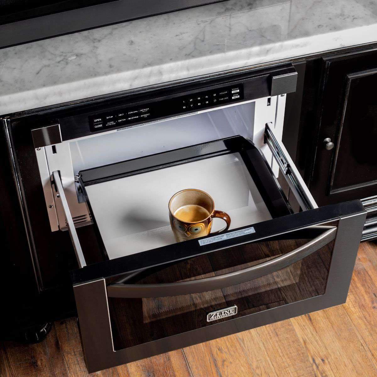 Black ZLINE built-in oven with door open and cup inside
