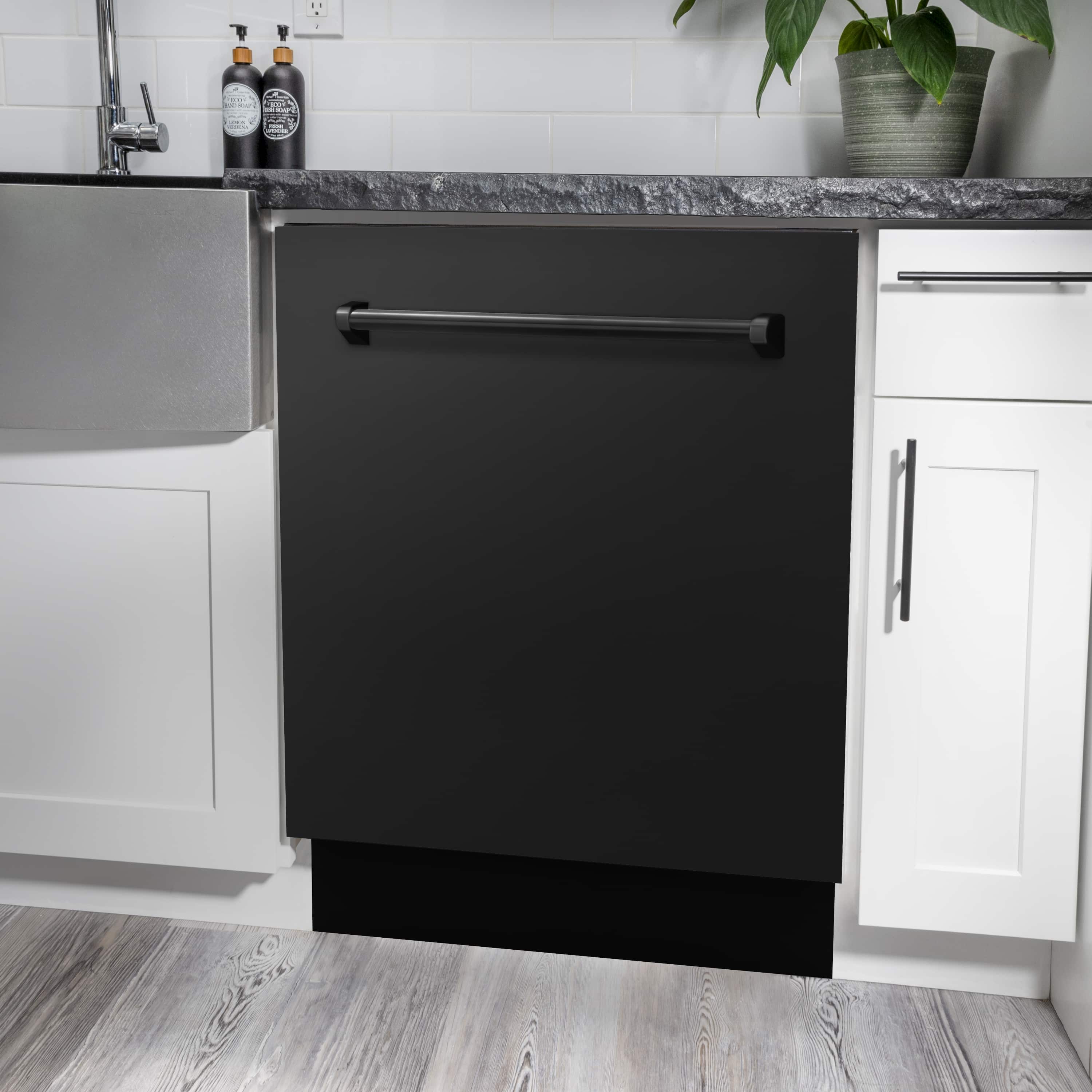 Built-in dishwasher with glossy black door and handle, stainless side panels