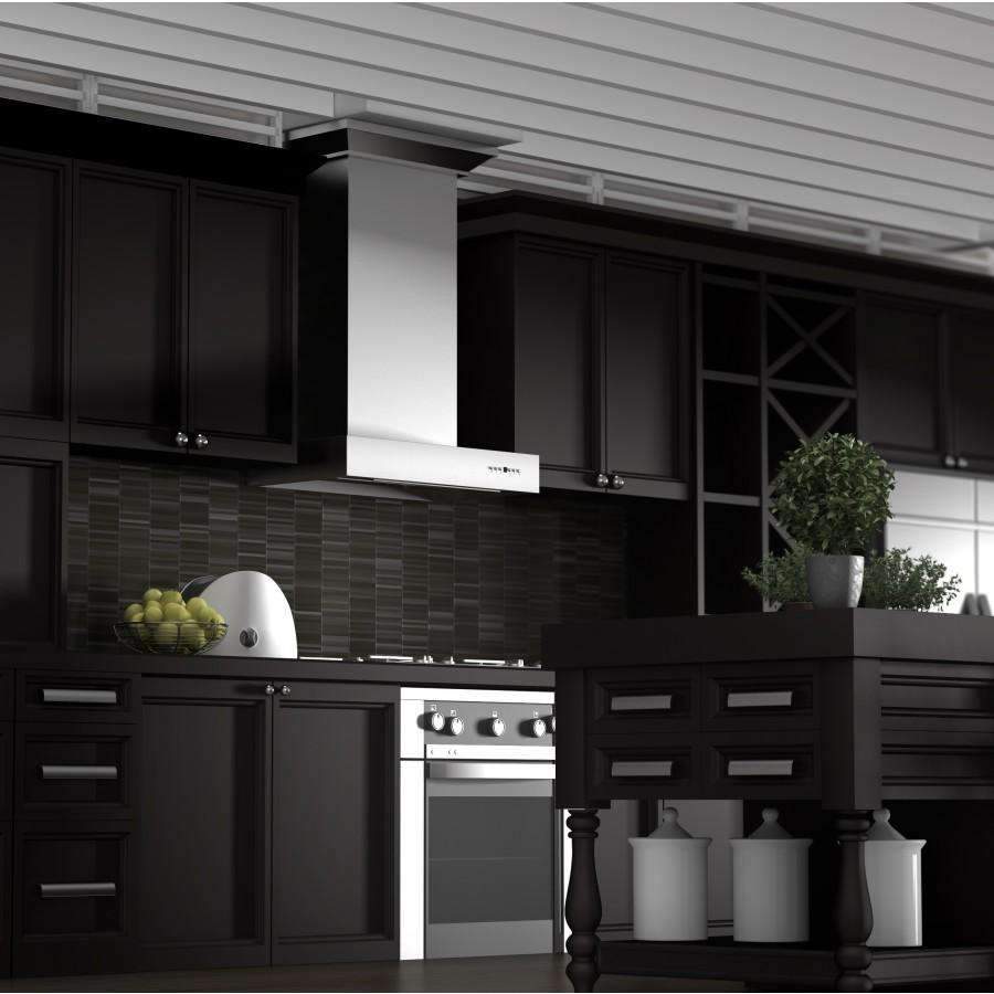 Stainless steel wall-mount range hood centered above the cooktop in dark cabinetry
