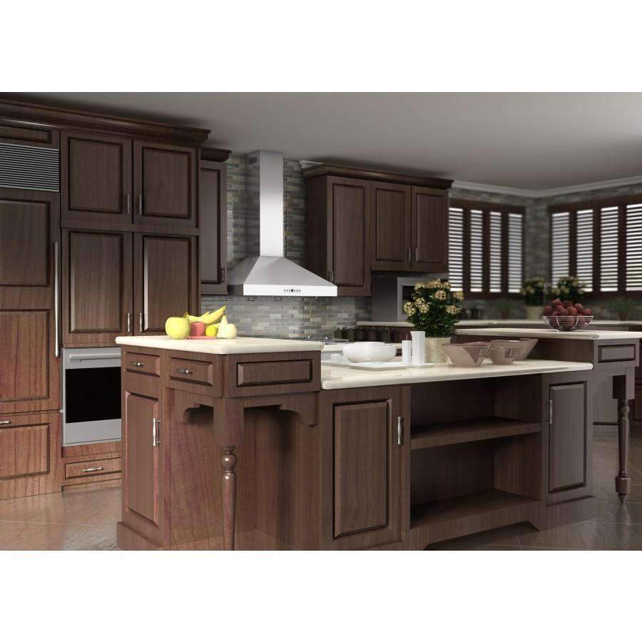 Stainless steel wall-mount range hood above a cooktop in a dark wood kitchen