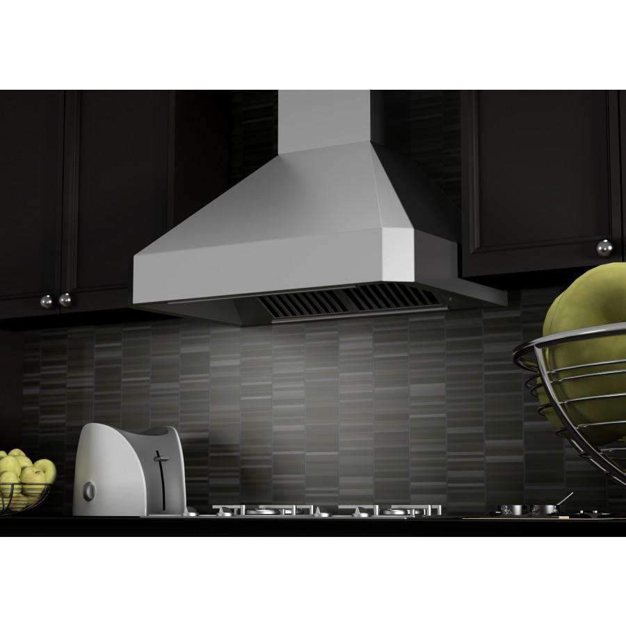 Stainless steel wall range hood with vent grille and circular fan cover