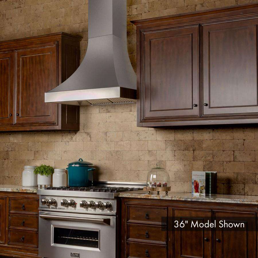 Stainless steel wall range hood with curved chimney and angled backsplash