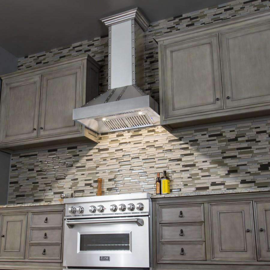 Stainless steel wall range hood with chimney chimney duct over stovetop