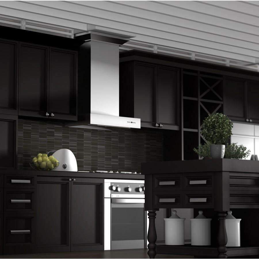 Stainless steel wall mount range hood over cooktop in dark cabinet kitchen