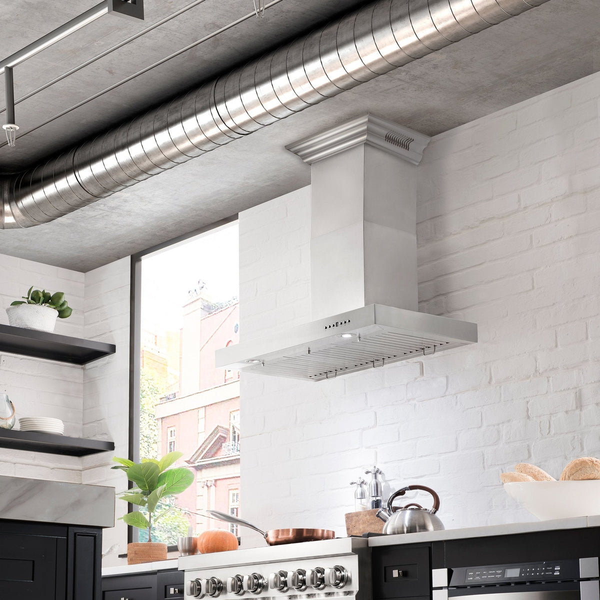 Installed stainless steel wall range hood chimney with vent grilles and control panel