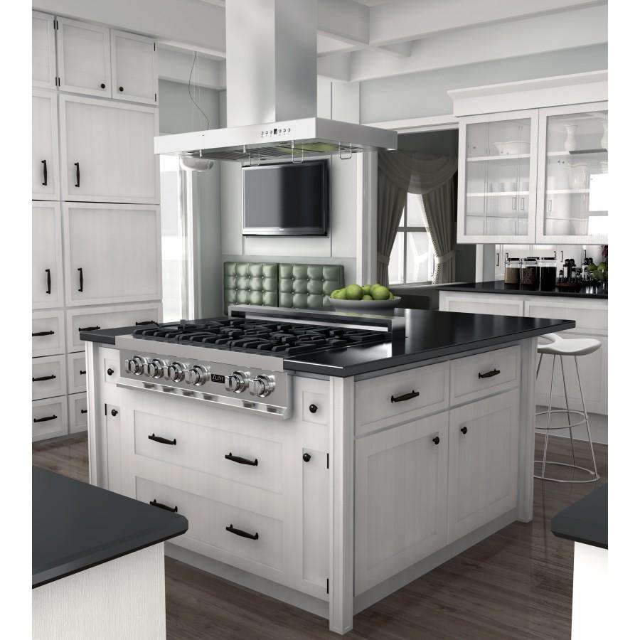 Stainless island range hood above gas cooktop with vented chimney and controls