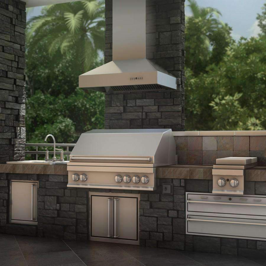 Outdoor stainless steel ducted wall mount range hood with chimney over outdoor grill