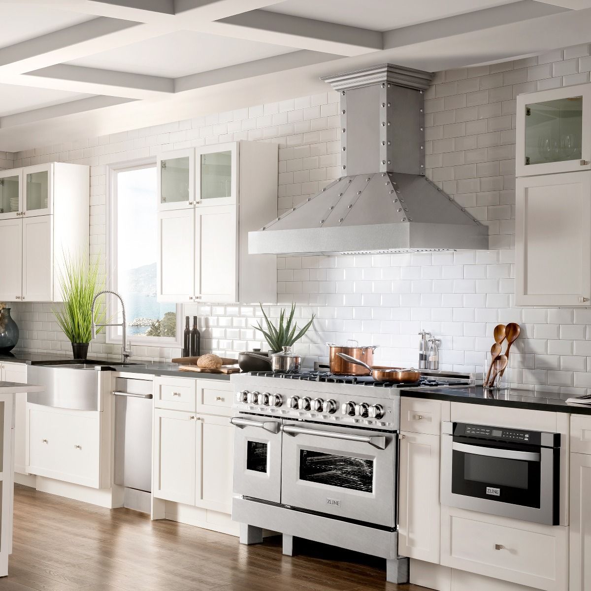 Stainless steel dual fuel range with two ovens, knob panel, and cooktop burners