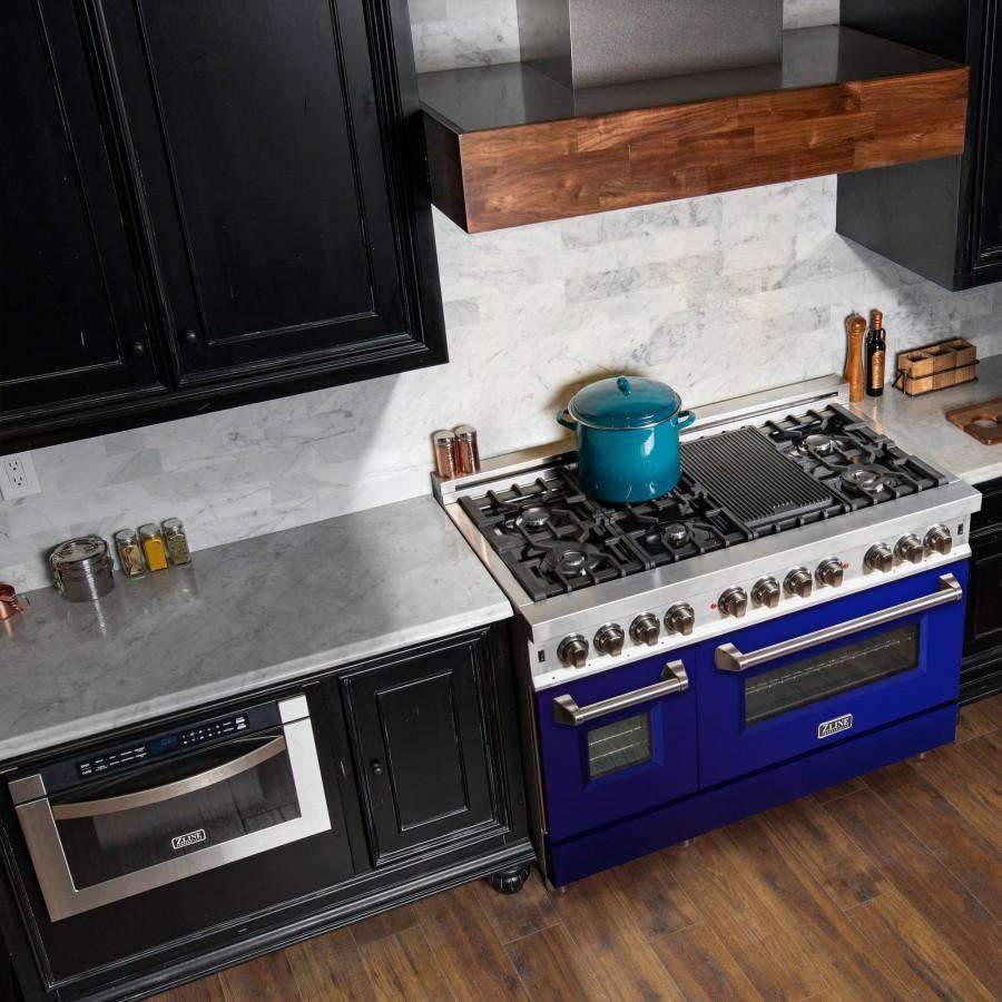 Dual fuel range with blue lower doors, stainless frame, and cooktop burners