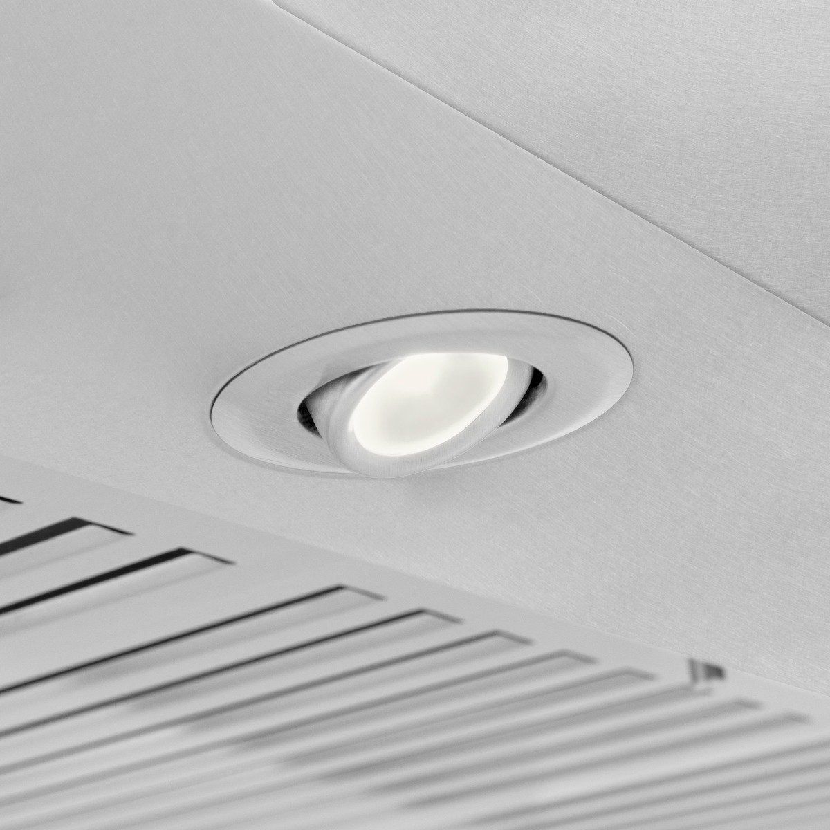 Wall mount range hood underside with built-in circular light