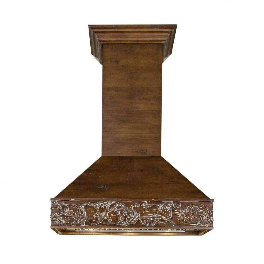 Wall-mounted wooden range hood with ornate carved crown molding, dark brown finish